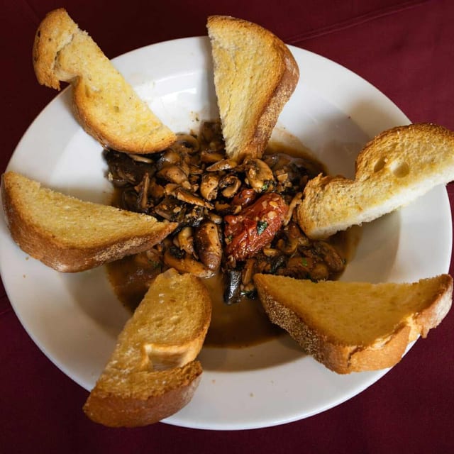 Funghi Al Funghetto with Toast Points.
